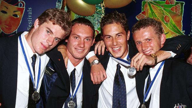 Australia Joeys Under-17 soccer player (l-r) Iain Fyfe with Aaron Goulding, Louis Brain and Matthew Milosevic wearing medals at Adelaide Airport in 1999.