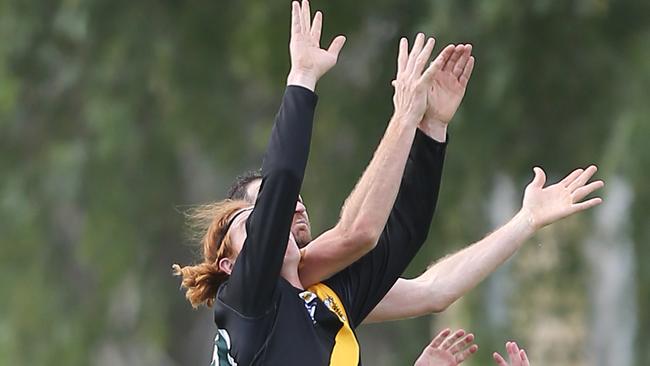 Rochester’s Mitch Cricelli tries to take a mark last year. He’s playing for the club again this year. Picture Yuri Kouzmin