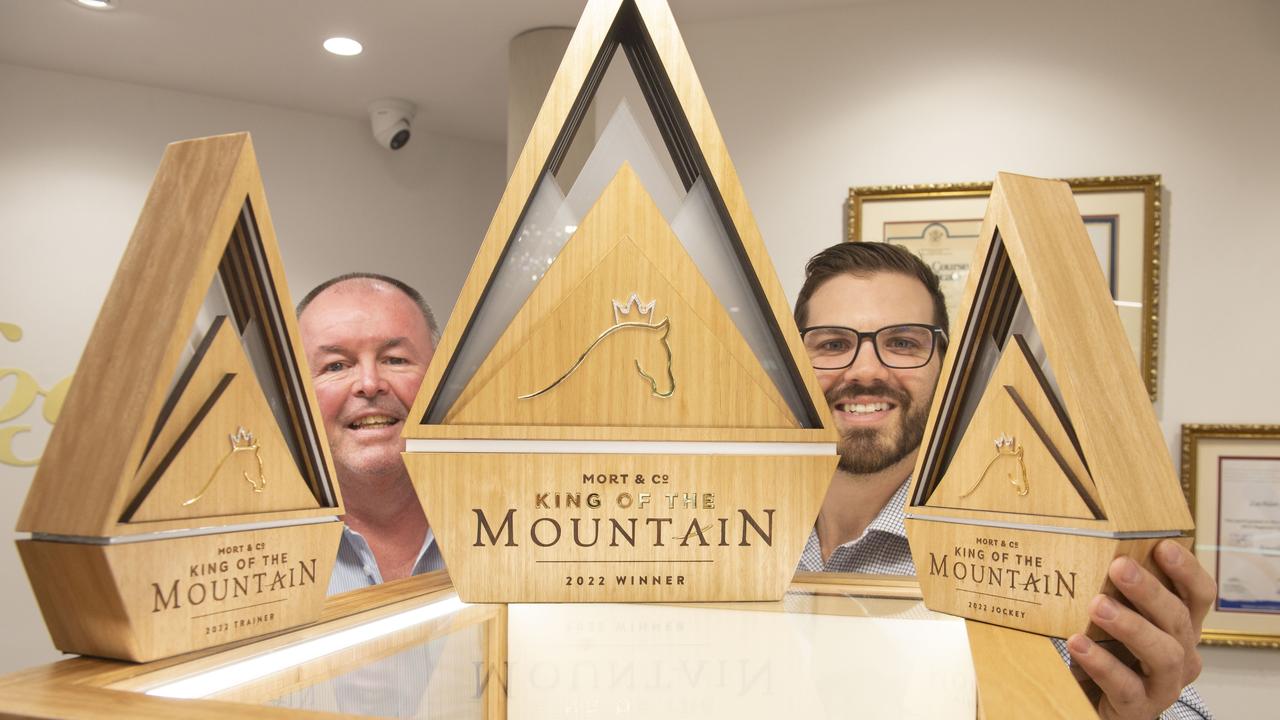 Paul Reedy (left) and Lachlan Hogan, jeweller with the King of the Mountain trophies at Hogans Family Jewellers. Picture: Nev Madsen.