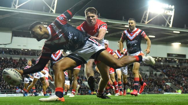 Daniel Tupou scores a try for the Sydney Roosters. Picture: Nathan Stirk/Getty Images