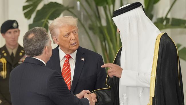 Witkoff with Trump and Qatar’s Emir Sheik Tamim bin Hamad Al Thani in Doha on May 14. Picture: AP