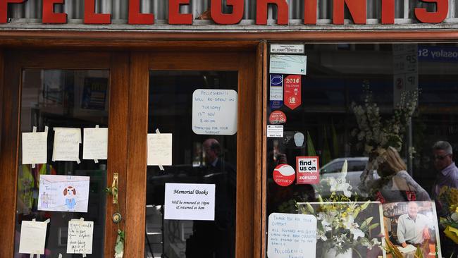 A large makeshift shrine quickly grew for Sisto Malaspina outside Pellegrini's Espresso Bar after he was identified as the victim of a lone terrorist. Picture: Getty Images