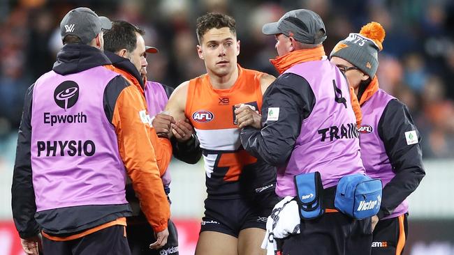 A groggy Kelly is ruled out of the match with concussion. Picture: AFL Media/Getty Images