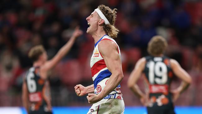 SYDNEY, AUSTRALIA – MAY 18: Aaron Naughton of the Bulldogs celebrates a goal during the round 10 AFL match between Greater Western Sydney Giants and Western Bulldogs at ENGIE Stadium, on May 18, 2024, in Sydney, Australia. (Photo by Matt King/AFL Photos/via Getty Images)