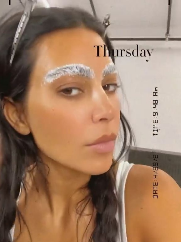 Kim Kardashian documented the process of going from dark hair to blonde on Instagram, starting with bleaching her brows. Picture: Instagram/KimKardashian