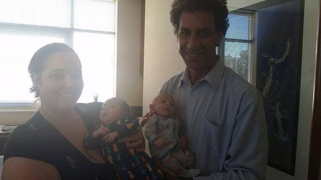 Dr Justin Nasser with twin babies he helped deliver: Photo: Facebook