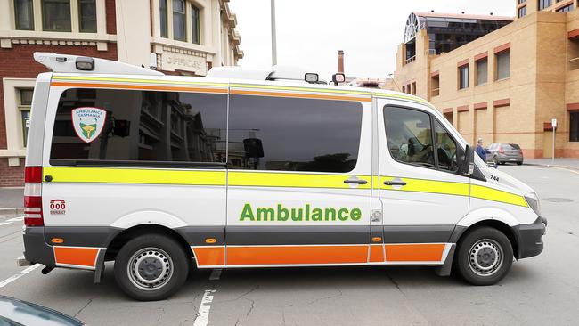 An Tasmanian Ambulance with lights and sirens struggles to get through traffic on Campbell St, Hobart. Picture: RICHARD JUPE generic / emergency / health / Royal Hobart Hospital / Tasmania Ambulance / file