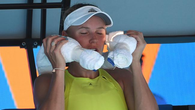 Caroline Wozniacki feeling the heat against Jana Fett. Picture: AFP