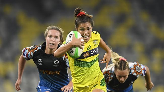 Madison Ashby on her way to scoring during the Oceania Sevens Challenge match.