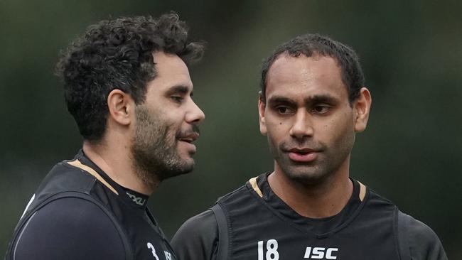 Daniel Wells and Travis Varcoe talk during a Collingwood Magpies AFL training session at the Holden Centre in Melbourne, Friday, September 13, 2019. (AAP Image/Scott Barbour) NO ARCHIVING