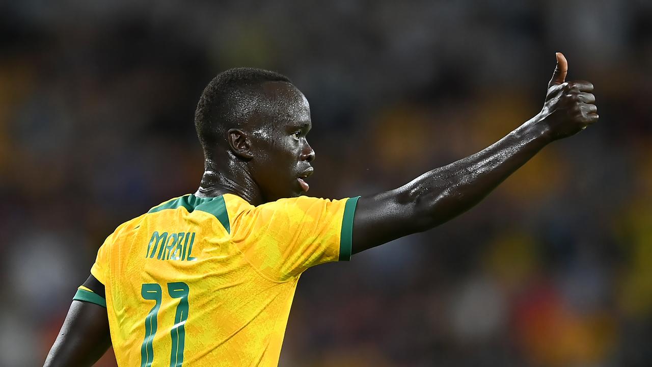 Awer Mabil acknowledges the crowd after scoring for the Socceroos against New Zealand. Picture: Albert Perez/Getty Images