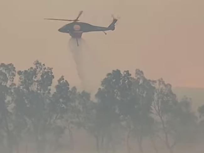 Smoke blankets Melbourne as bushfires burn out of control