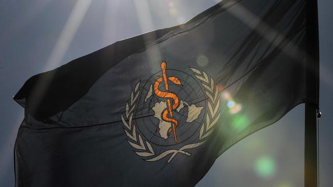 A flag bearing the World Health Organization (WHO) logo is seen at WHO’s headquarters in Geneva. Picture: Fabrice Coffrini