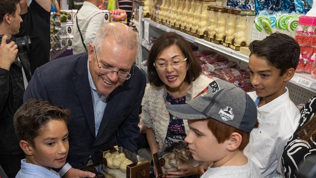 Prime Minister Scott Morrison visits Wallies Lollies in Box Hill South, Victoria with Treasurer Josh Frydenberg. Also attending is Ms Gladys Liu, member for Chisholm, Mrs Aimee Frydenberg and Mr Peter Stapelfeldt, Owner, Wallies Lollies, Mrs Michelle Stapelfeldt, Owner, Wallies Lollies. Mr Frydenberg's children Gemma and Blake attended too. Picture: Jason Edwards