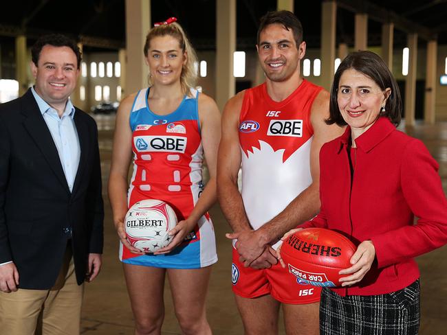 NSW Minister for Sports Stuart Ayres and State Premier Gladys Berejiklian with NSW Swifts netballer Sophie Garbin and Sydney Swans captain Josh Kennedy at the announcement of a $65 million facility at Moore Park.