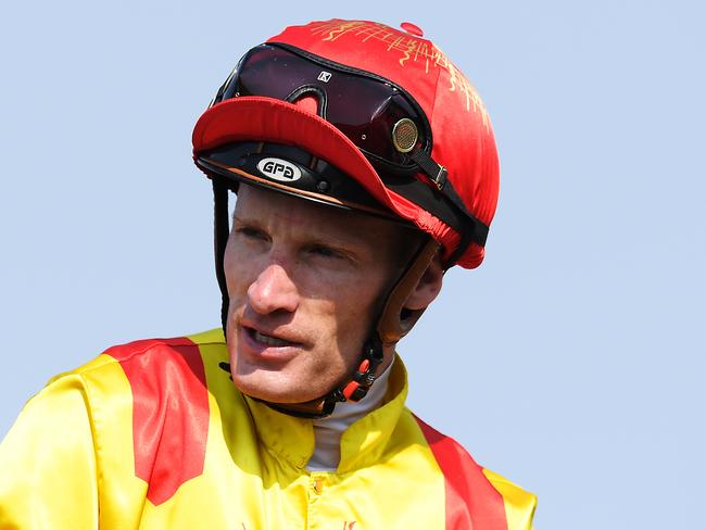 Jockey Mark Zahra returns to scale after riding Chains of Honour to victory in race 5, the Grand Prix Stakes, during Metro Races at Eagle Farm Racecourse in Brisbane, Saturday, December 21, 2019. (AAP Image/Albert Perez) NO ARCHIVING, EDITORIAL USE ONLY