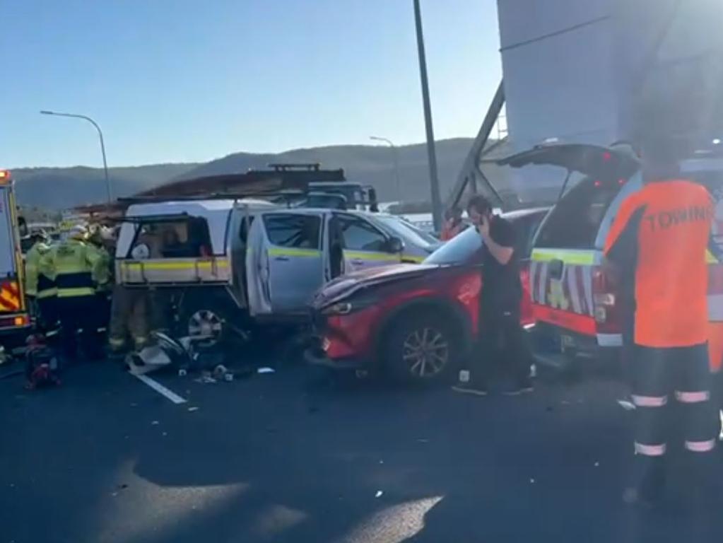 The truck driver was freed after suffering serious lower body injuries.