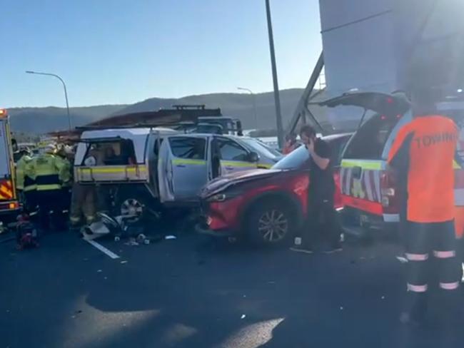 The truck driver was freed after suffering serious lower body injuries.