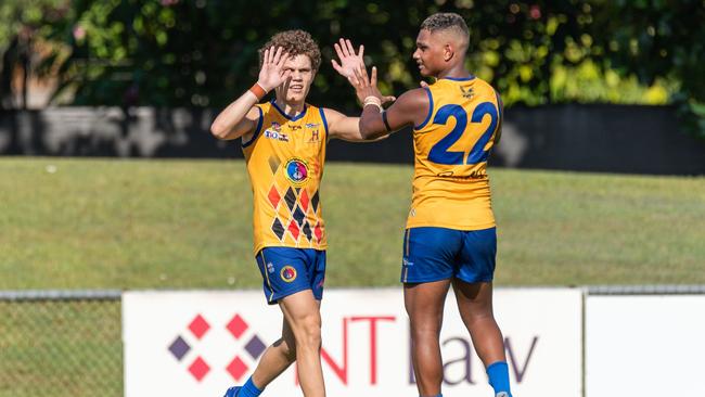 Nichols medallist Beau O'Connell and Stanley Tipiloura celebrate a Wanderers goal. Picture: Chris Kent AFLNT/Media