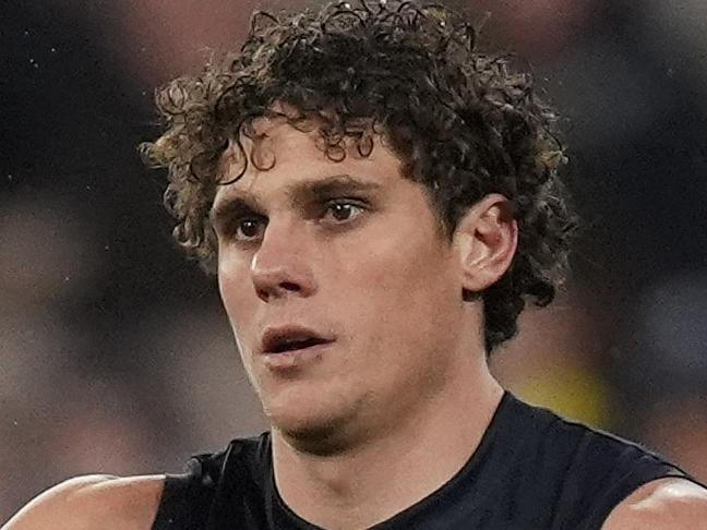MELBOURNE, AUSTRALIA - JUNE 30: Charlie Curnow of the Blues celebrates kicking a goal during the round 16 AFL match between Richmond Tigers and Carlton Blues at Melbourne Cricket Ground, on June 30, 2024, in Melbourne, Australia. (Photo by Daniel Pockett/Getty Images)