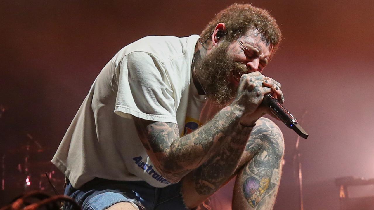 Sydney weather throws Post Malone concert at The Domain into chaos