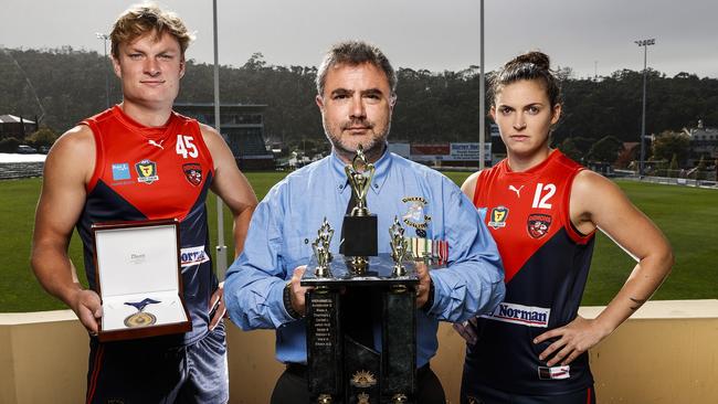 North Hobart co-captain Jack Sandric and North Hobart women's player Emily Mifsud alongside veteran Josh Weir ahead of their ANZAC Day match against Launceston. Picture: Zak Simmonds