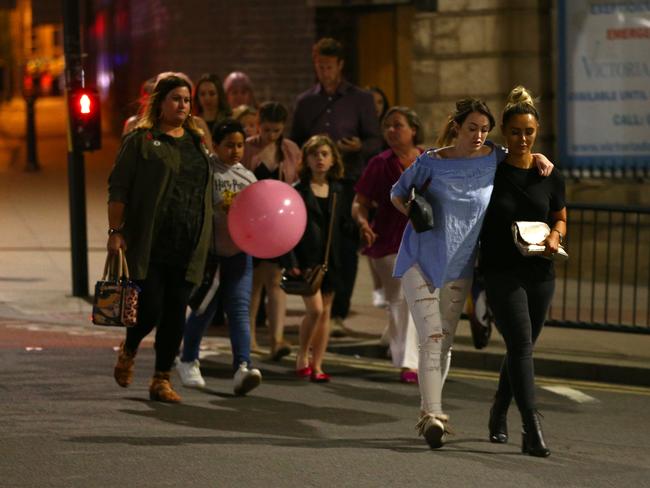 People escorted from the Manchester Arena where Ariana Grande had performed. Picture: Getty