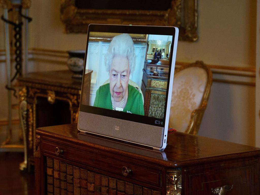 Queen Elizabeth II appears on a screen via videolink from Windsor Castle, where she is in residence, during a virtual audience to receive the Ambassador of Andorra, Carles Jordana Madero. Picture: Victoria Jones-WPA Pool/Getty Images