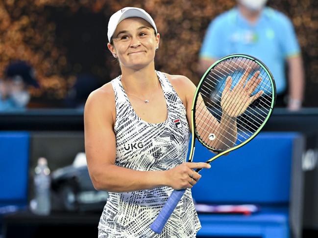 Ashleigh Barty of Australia reacts after winning her first Round Women's singles match against Lesia Tsurenko of Ukraine on Day 1 of the Australian Open, at Melbourne Park, in Melbourne, Monday, January 17, 2022. (AAP Image/Dave Hunt) NO ARCHIVING