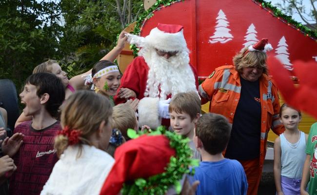 Santa Claus, pictured at the Grafton Christmas Carols on Monday. He will be at Goonellabah tomorrow for a community Christmas party. Picture: Debrah Novak