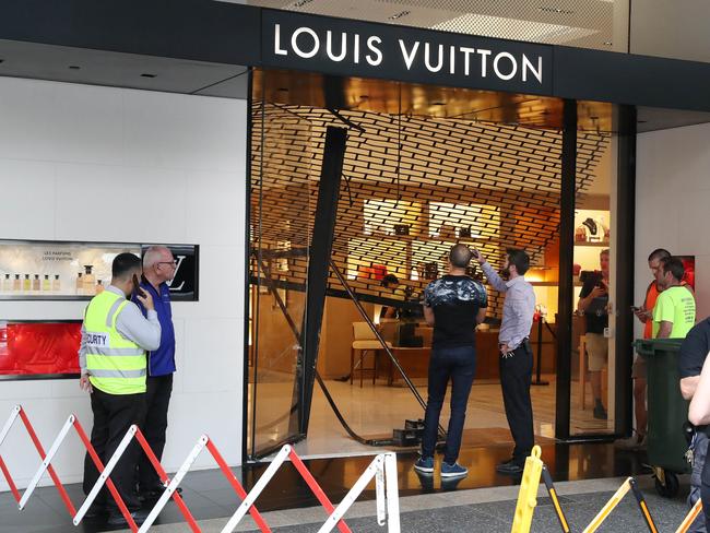 Louis Vuitton's damaged doors after a ram raid on their CBD store, Brisbane. Photographer: Liam Kidston