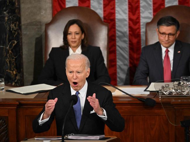 TOPSHOT - US President Joe Biden delivers the State of the Union address in the House Chamber of the US Capitol in Washington, DC, on March 7, 2024. (Photo by Mandel NGAN / AFP)