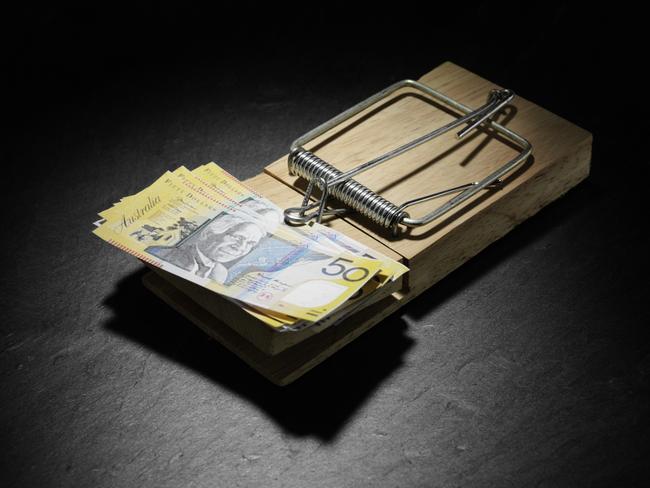 Australian dollars in a mousetrap. money, generic $50 notes