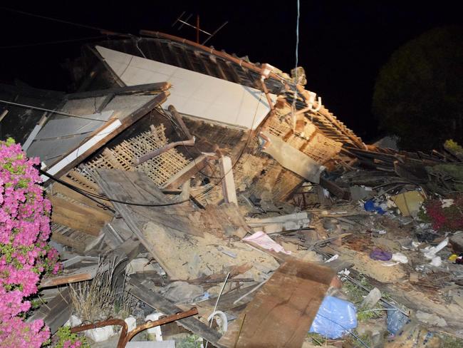 A house collapses following the earthquake in Mashiki, near Kumamoto city, southern Japan. Picture: AP