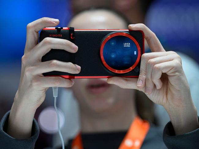 The factory produces one smartphone per second. (Photo by Josep LAGO / AFP)