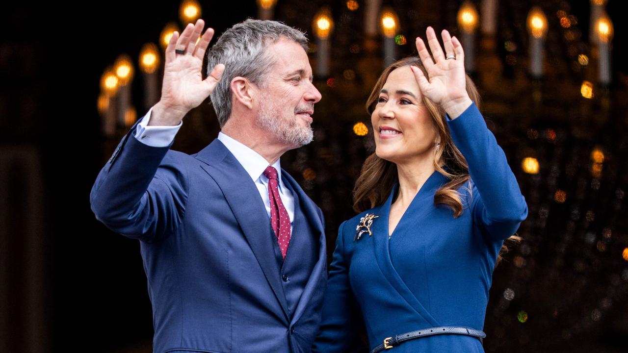 King Frederik X of Denmark and Queen Mary of Denmark wave from the balcony of Frederik VIII's Palace on the occasion of the king's 57th birthday. Picture: Ida Marie Odgaard / Ritzau Scanpix / AFP