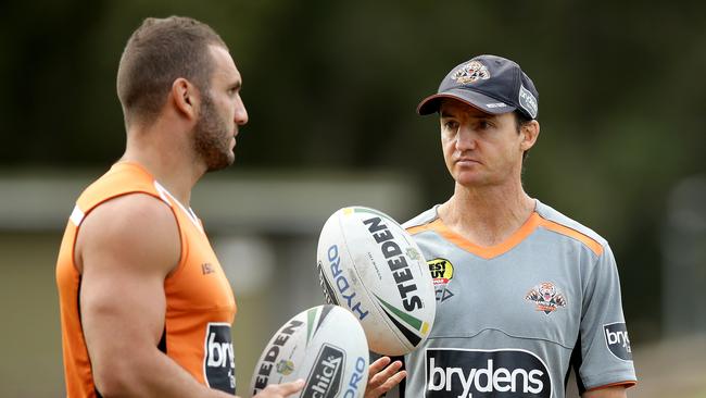 Robbie Farah and coach Jason Taylor during the Wests Tigers training.