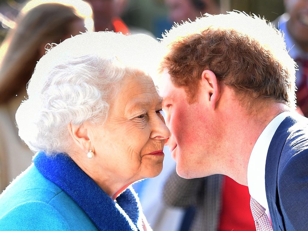 Prince Harry with the Queen, before he stepped down from royal life. Picture: WPA Pool / Getty Images.