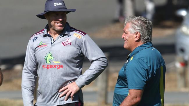 RA’s director of rugby Scott Johnson, right, talks with Reds coach Brad Thorn in Brisbane last month. Picture: Getty Images