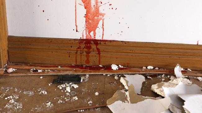 Red splatters inside the derelict house on Batten Rd, Charlemont. Picture: Alison Wynd