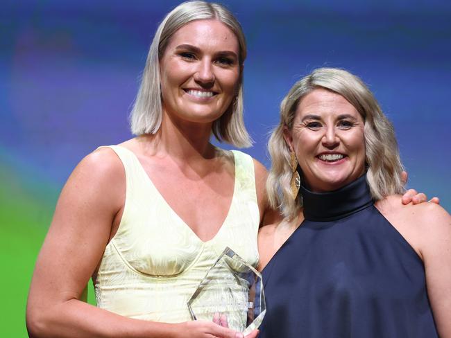 MELBOURNE, AUSTRALIA - NOVEMBER 25: Courtney Bruce (L)  poses with Stacey Marinkovich after receiving the Australian International Player of the Year award during the 2023 Australian Netball Awards at The Forum on November 25, 2023 in Melbourne, Australia. (Photo by Graham Denholm/Getty Images)