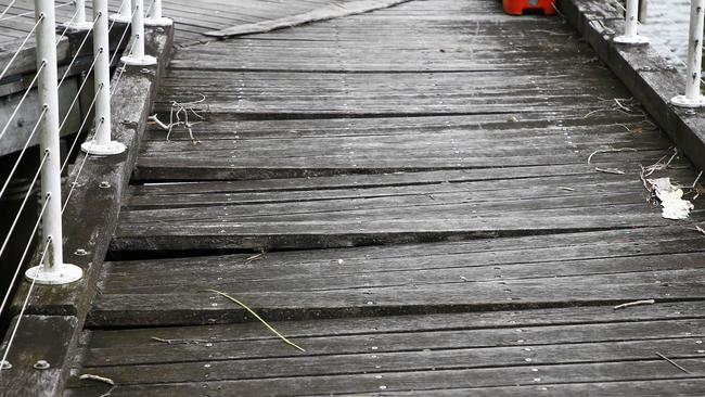 A damaged boardwalk at Couran Cove. Picture: Tertius Pickard