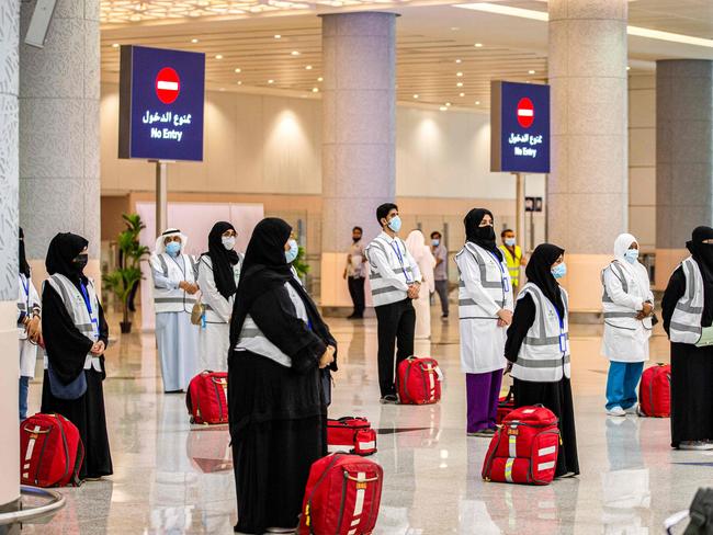 Saudi health workers. The Kingdom will give money to families of those who died during the pandemic. Picture: AFP