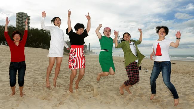 Chinese tourists on Main Beach on the Gold Coast. Photo: Tim Marsden