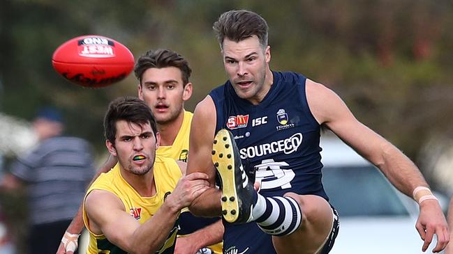 Keegan Brooksby gets a kick away in action for South Adelaide. Picture: Tait Schmaal.