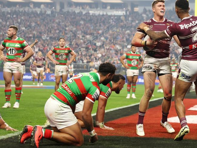 LAS VEGAS, NEVADA - MARCH 02: ReubenÃÂ Garrick of the Sea Eagles celebrates with JasonÃÂ Saab of the Sea Eagles after scoring a try during the round one NRL match between Manly Sea Eagles and South Sydney Rabbitohs at Allegiant Stadium, on March 02, 2024, in Las Vegas, Nevada. (Photo by Ezra Shaw/Getty Images)