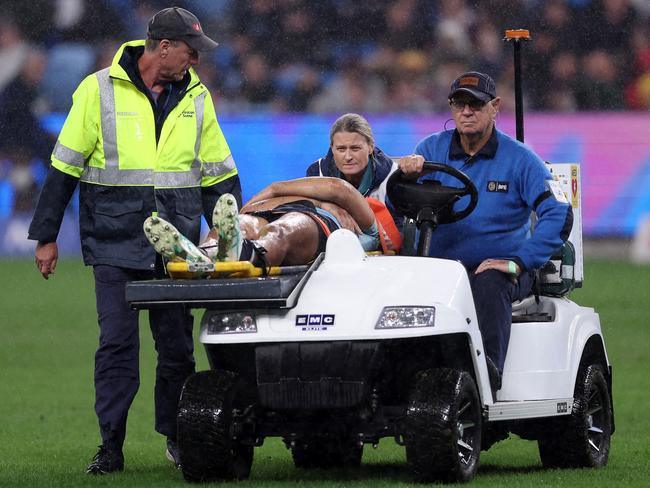 Joseph-Aukuso Suaalii is taken from the field after an incident in which he broke his jaw. Picture: Getty Images