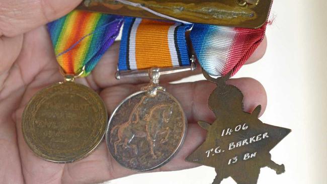 Graham Guth at Rockhampton Military Museum with the medals which were lost on East Street. Picture: Jann Houley