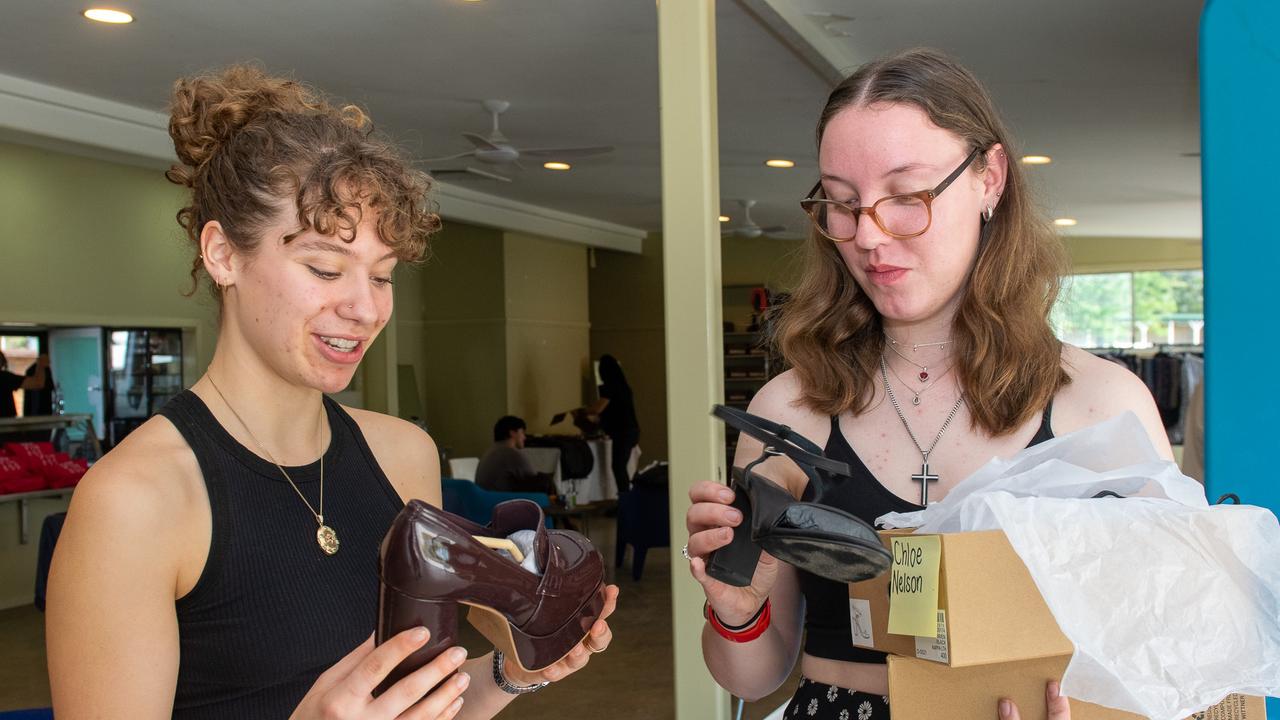 Richmond River Highschool captain Lily Shepherd with Chloe Nelson checking out shoes at the Lismore Showgrounds from Wittner Shoes of Melbourne, who together with Bec + Bridge and Thread Together have brought brand new outfits to give flood-impacted Lismore students some glam for their final school hurrah.