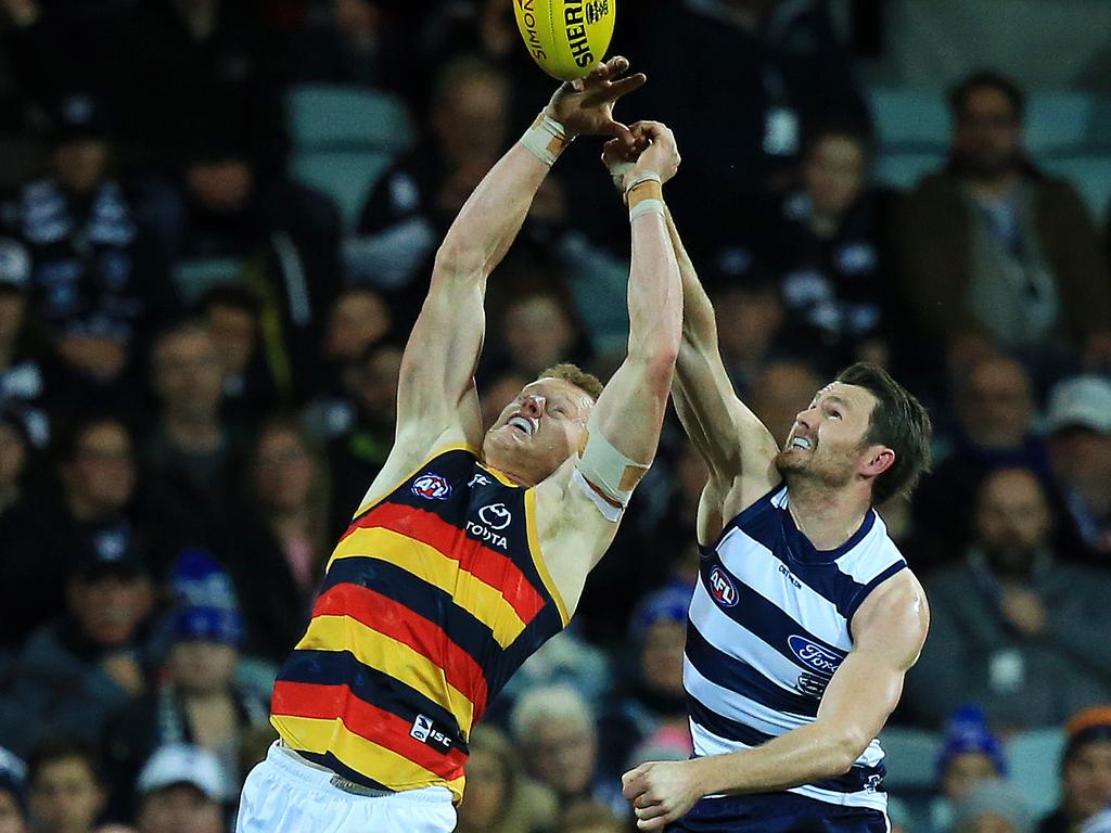 Geelong’s Patrick Dangerfield spoils Adelaide’s Reilly O'Brien. Picture: Mark Stewart